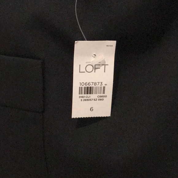 New with tags black skirt, with front pockets. - Picture 2 of 3